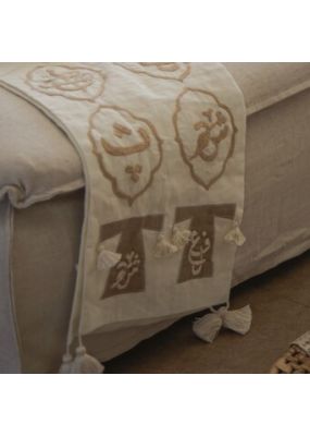 Thawb Dresses and Calligraphy Table Runner